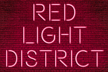 RED LIGHT DISTRICT - Neon Letters sign lighting on brick wall background