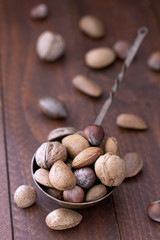 Almonds, walnuts and hazelnuts in metallic bowl
