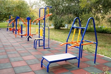 "Sports field with exercise machines"!