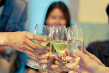 Asian group of friends having party with alcoholic beer drinks and Group people with champagne dancing at party.