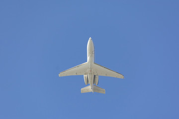Fototapeta na wymiar private jet airplane on blue sky composition photography