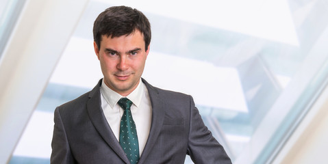 Portrait of successful businessman in formal suit