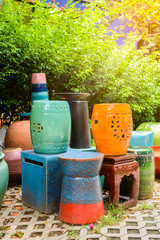 multicolored ceramic bowls, Colorful pots and cups or vases handcrafted.