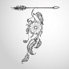 Ethnic dreamcather on arrow,
