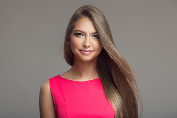 Portrait of young beautiful smiling happy woman. Long hair.