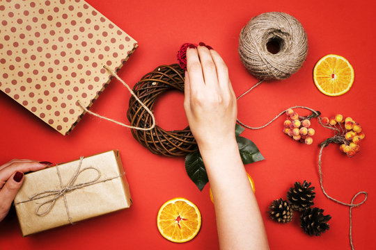 Woman doing gifts. New year, Christmas, holiday.