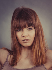 Pretty young woman having fringe hairstyle