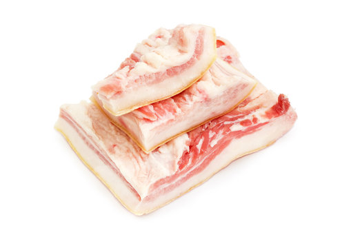 Pieces of pork belly with skin in salt