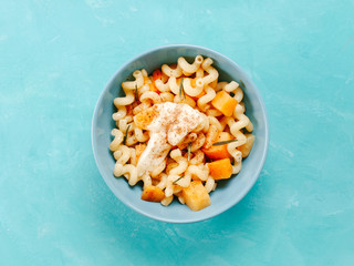 Fusilli pasta with pumpkin, rosemary and brie