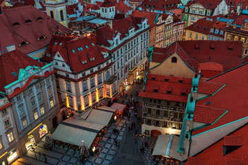 Red roofs, houses and street in Old Town of Prague.