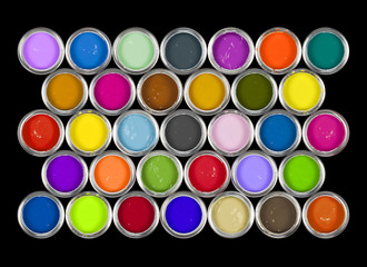 Cans of paint/ink on a black background. 33 tins.