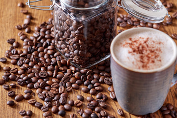 Aroma coffee chocolate cookies and spices on the wooden table. Dark wooden background. Top view. Close. Closeup.