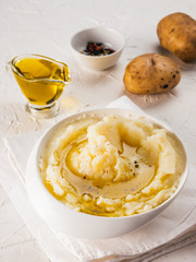 Mashed potatoes on white concrete background