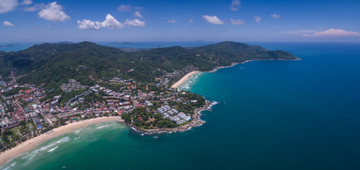 Fototapeta premium Blue Sky Over Kata And Kata Noi Beaches In Phuket, Thailand, Aerial Panorama Shot