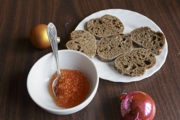 Canape with red caviar for party