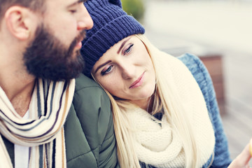 Young couple hugging in the city