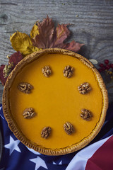 Obraz na płótnie Canvas Homemade Pumpkin Pie for Thanksgiving Ready to Eat. Design mock up
