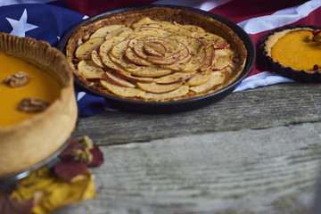 Autumn background. Homemade Pumpkin Pie for Thanksgiving Ready to Eat. Copy space for text. Design mock up