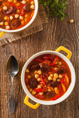 Traditional chickpea soup with paprika and chorizo sausage.