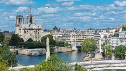 Fototapeta premium Paris, panorama of Notre-Dame cathedral and the Tournelle bridge in the center, ile de la Cite and ile Saint-Louis 