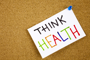 Memo note pinned to a cork notice board as reminder Think Health