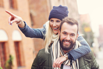 Young couple hugging in the city