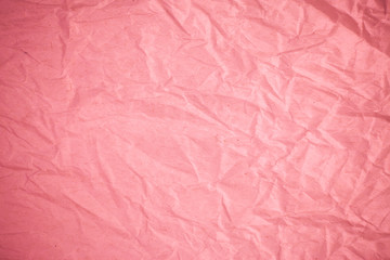 Fototapeta premium Crumpled recycle pink paper background.