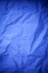 Blue crumpled paper texture background.