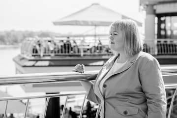 Cute young plus size woman goes shopping for fashion, gift vouchers, shopping and enjoys. Black Friday, Cyber Monday and Boxing Day. Fashion accessories and casual clothes for women