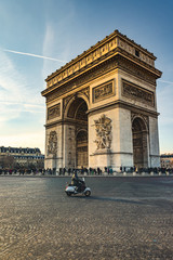 Fototapeta na wymiar Arc de Triomphe is one of the most famous monuments in Paris, standing at the western end of the Champs-Élysées at the center of Place Charles de Gaulle.