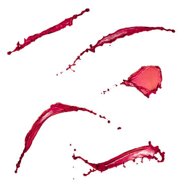 Beautiful collection of liquid splashes red color over white bac