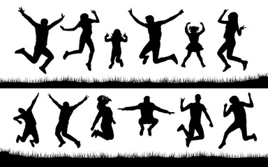 Silhouette of people jumping on the grass
