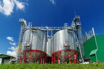 Obraz premium Steel silos installed on a powerful metal structure.