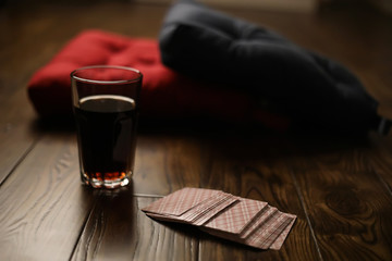 Pillows on a wooden parquet floor