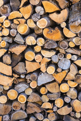Abstract view on stacked or piled fire wood.