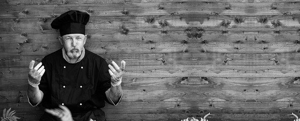 Farmer old in uniform with vegetables