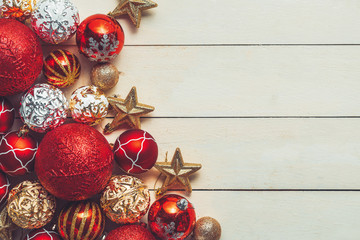 Christmas background with decorations on wooden background. Top view with copy space