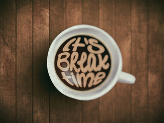 Coffee cup with time lettering, motivation quotes about time, awaking, right moment. Realistic black coffee on brown wooden background with motivation. Morning coffee