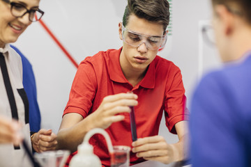 Students Having Chemistry Class at School