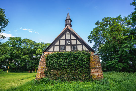 Old brick and stone church from XIV century in small village Chlebowo, Poland