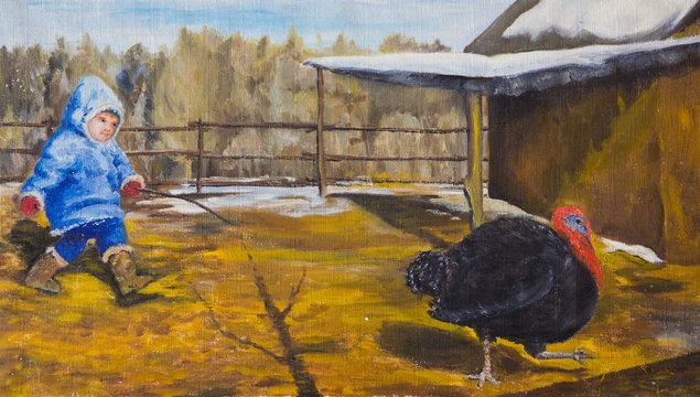 A child chasing a turkey around the yard