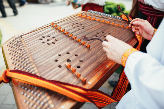 Man Plays On A Hammered Dulcimer