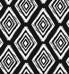 Hand drawn seamless tribal pattern in black and cream. Modern textile, wall art, wrapping paper, wallpaper design.