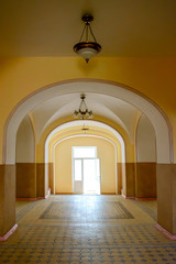 Photo of yellow brown retro hall in old hospital