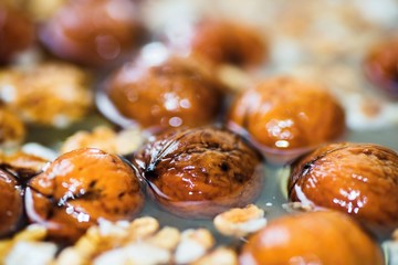 Whole walnut in water.