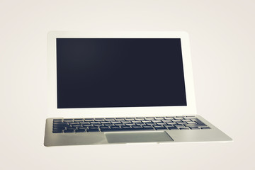 Laptop against plain background