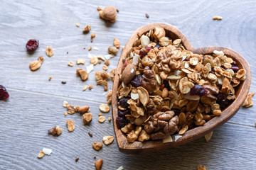 homemade granola in wooden bowl
