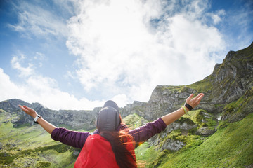 Obraz premium Toned photo of tourist girl with backpack