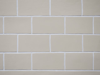 Old square bricks on wall background. Texture.
