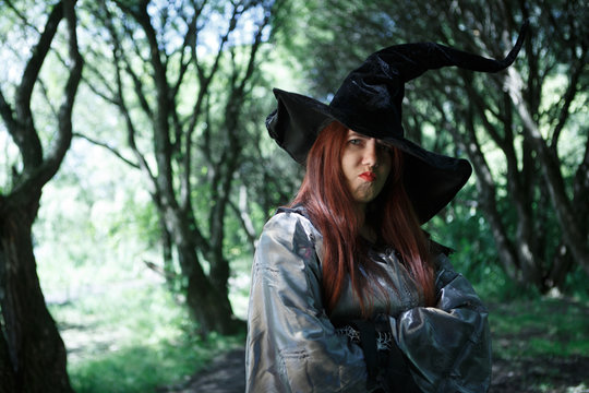 Photo of dissatisfied witch in long black hat